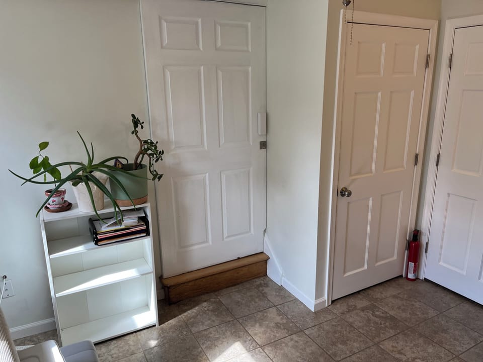 Private lower level suite with door to Main Level closed