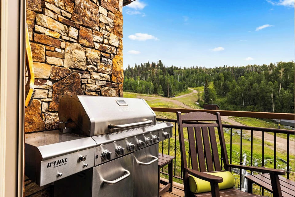 Grill Area: Gas grill on balcony, mountain views
