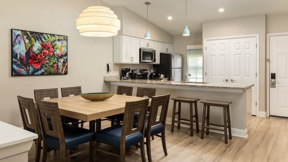 Gather for easy meals in the open kitchen and dining.