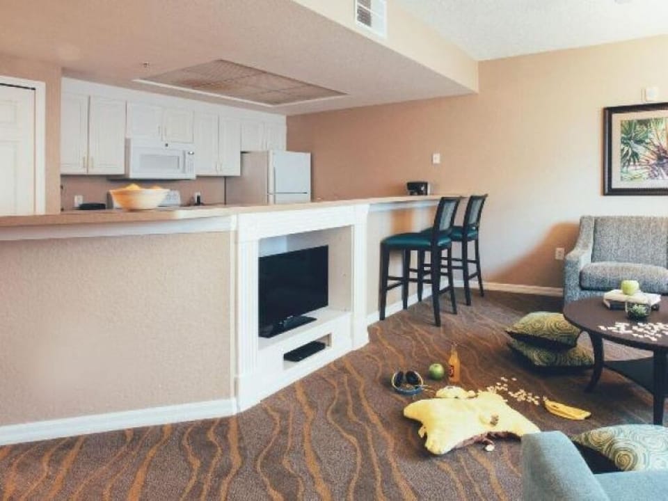 Relax in the open living space with casual bar seating.