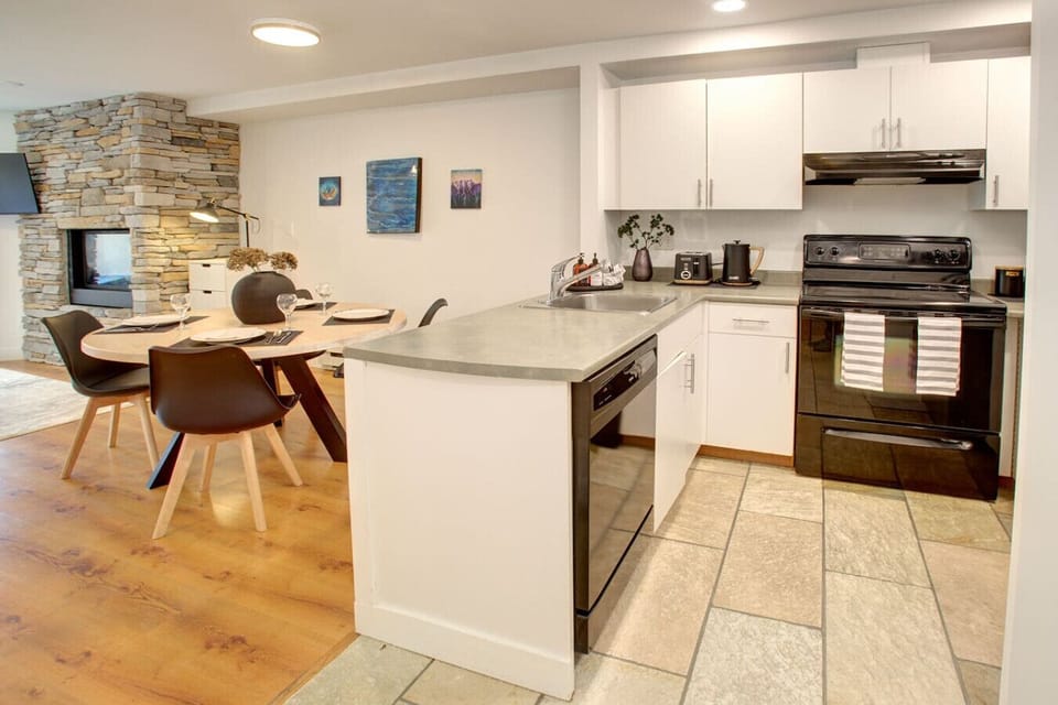 Kitchen with all the appliances you would need in an Air Bnb