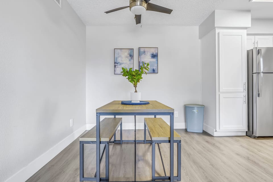 Bright corner dining table perfect for breakfast with a fresh brew.