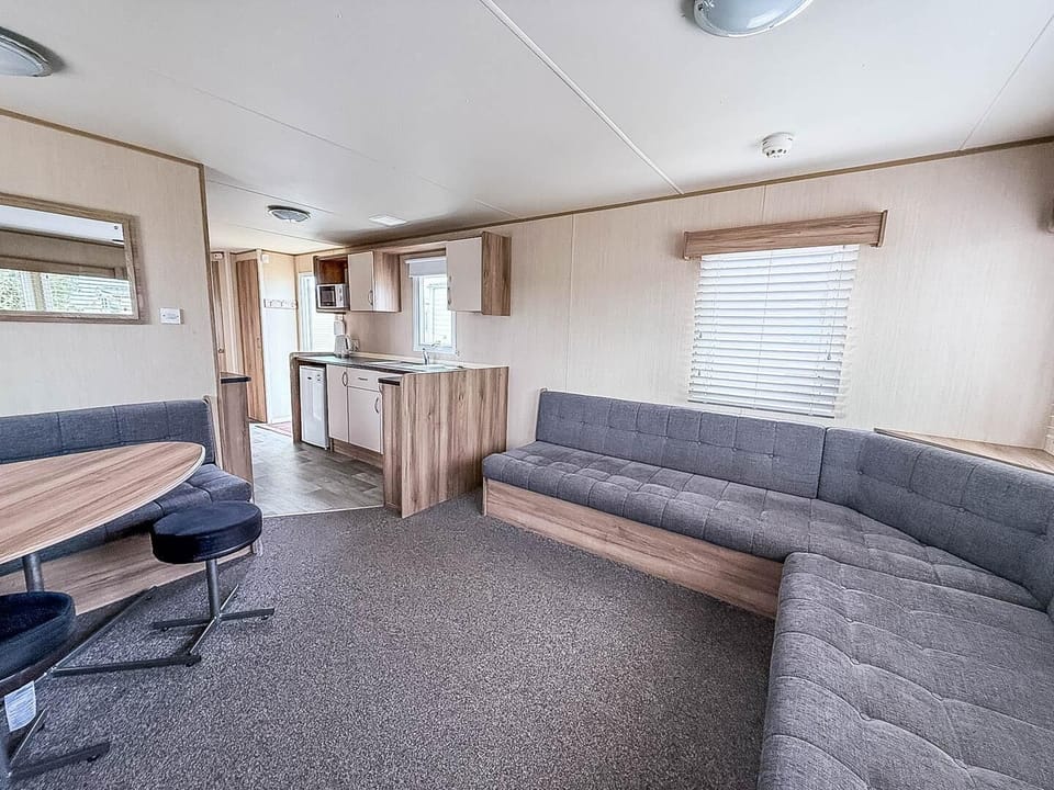 This inviting space is the ideal spot to relax after a day spent by the ocean
