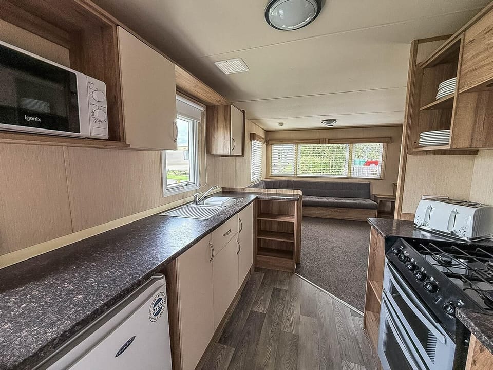 Experience true freedom during your UK holidays with a versatile kitchen space designed for spontaneity and ease.