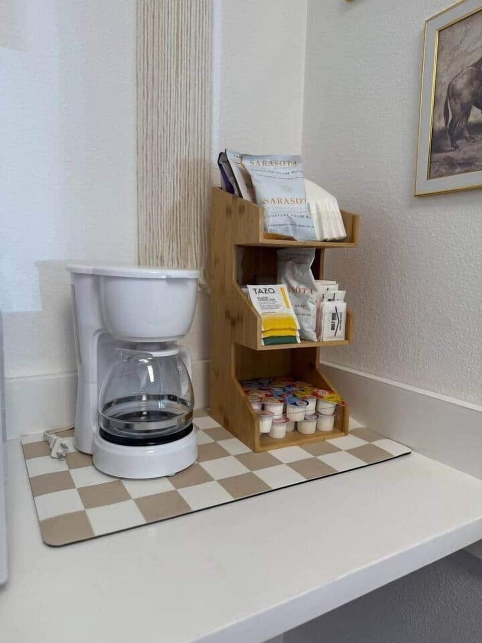 Morning made easy. This little coffee corner has everything from creamer to tea to your daily caffeine fix. Just brew, sip, and start your day the cozy way. 