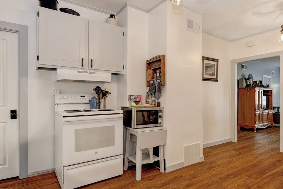 Dishes, crockpot, electric grill, electric can opener, coffee pot