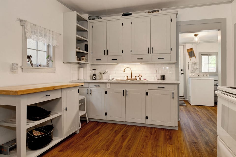 Dishes, crockpot, electric grill, electric can opener, coffee pot