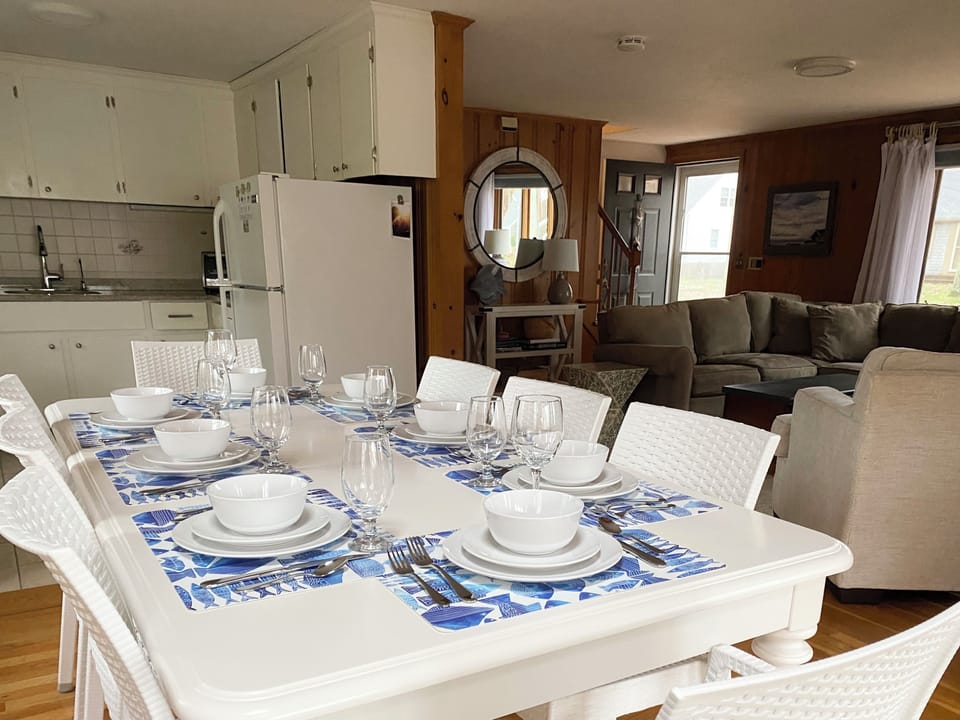 The open concept living space fits an expansive farm table to seat all 8 guests!