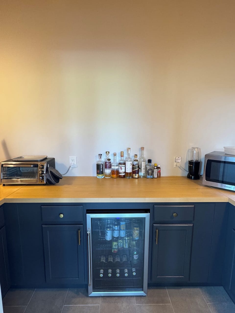 In the pantry you’ll find a drink fridge, toaster over/air fryer, and microwave