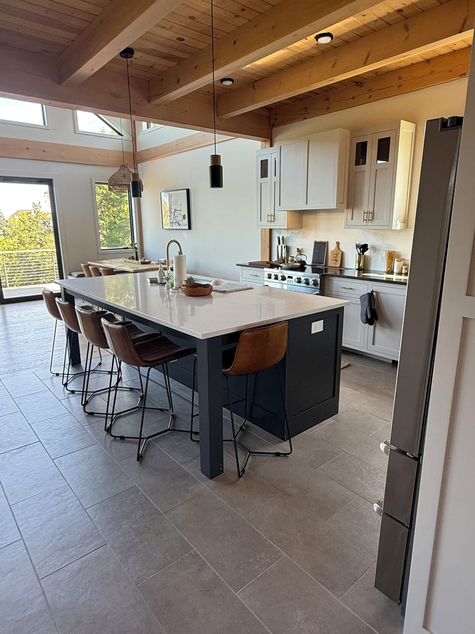 Our open kitchen with an oversized island that seats up to 5