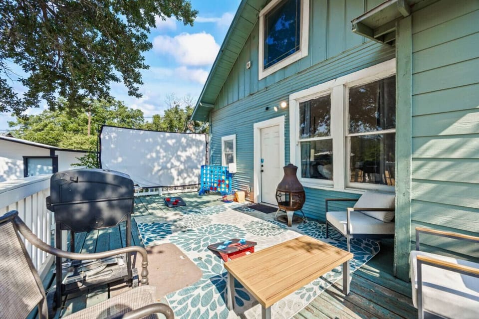 Backyard Bliss – Soak up the sun or enjoy an evening fire pit session in this cozy backyard retreat.