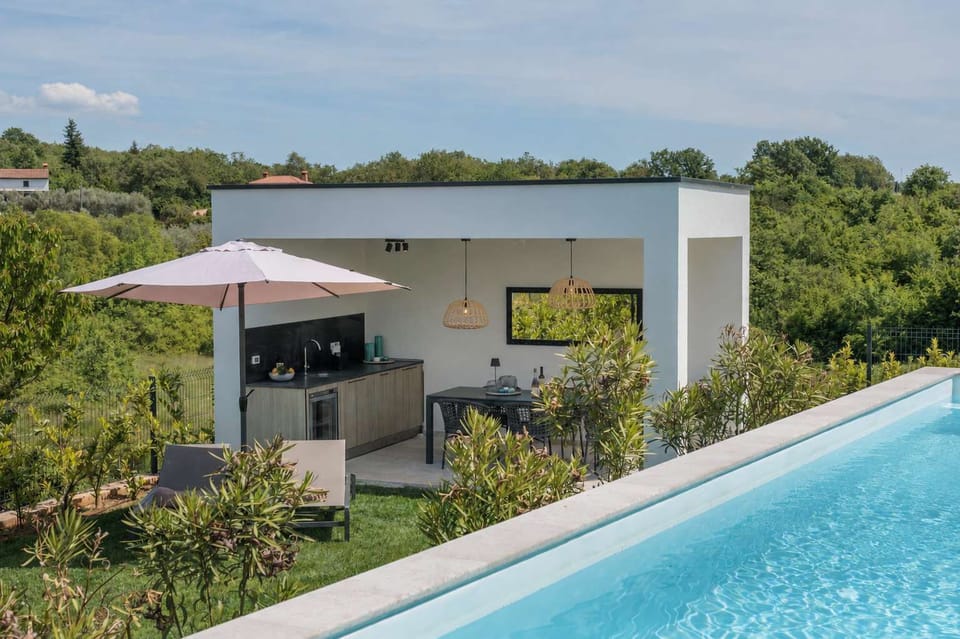 Pool, garden and outdoor kitchen