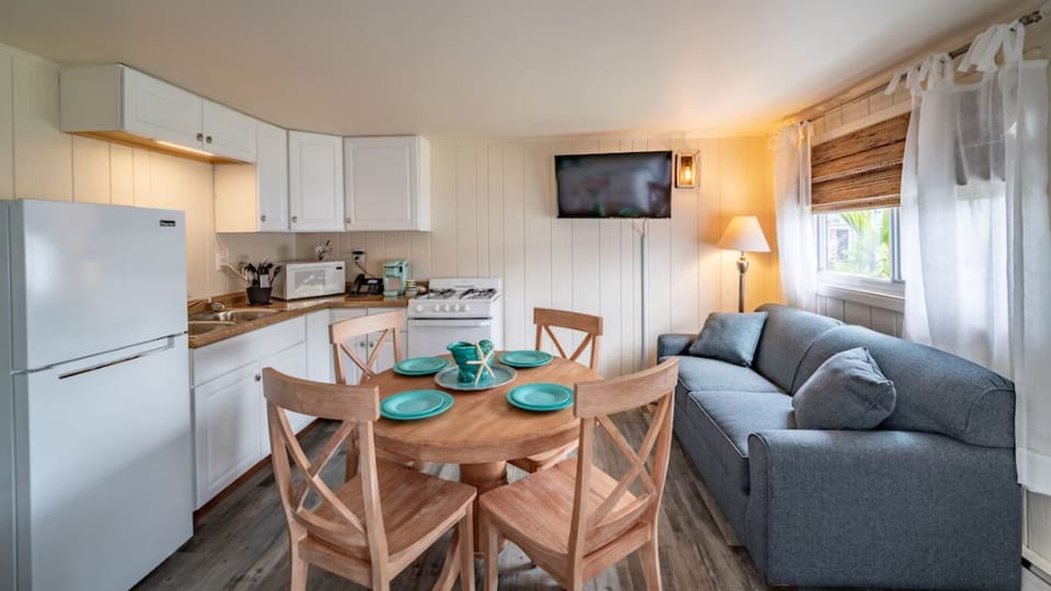 Gather for easy meals in the bright, fully equipped kitchenette.