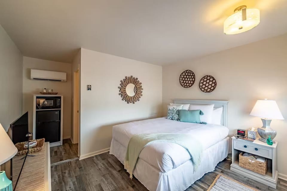 Unwind in a bright, airy bedroom with crisp linens.