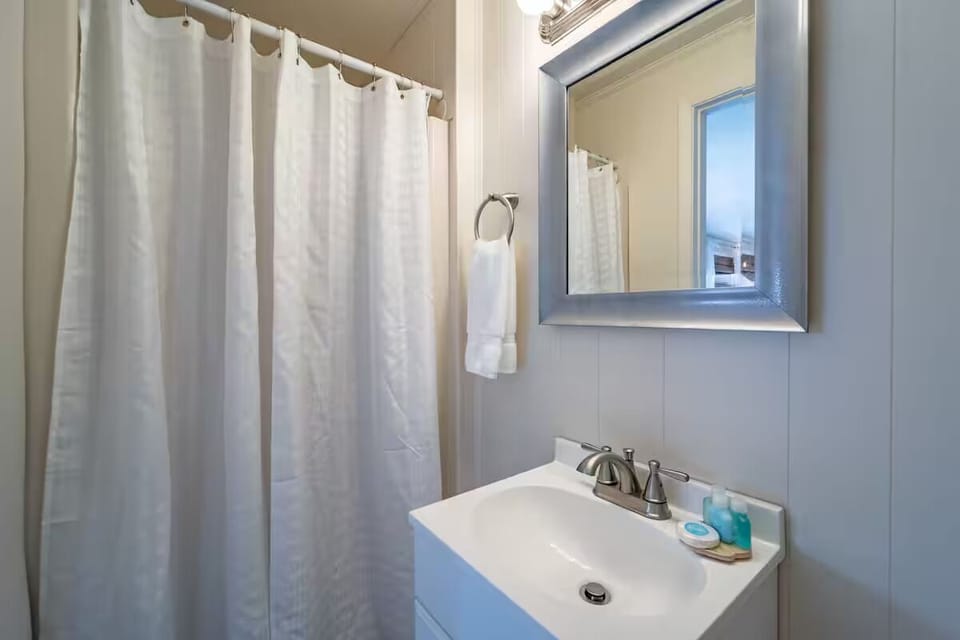 Start your day with a bright vanity and soothing shower.
