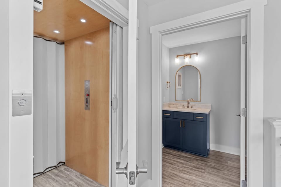 Elevator w/ Top level Half Bathroom