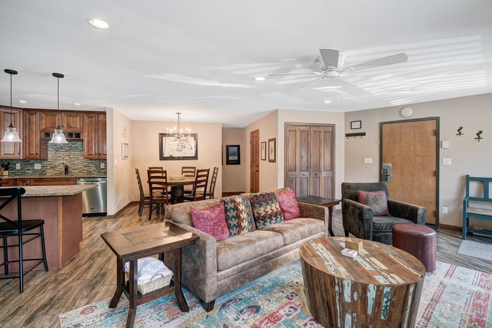 Living room with fireplace, and sofa sleeper