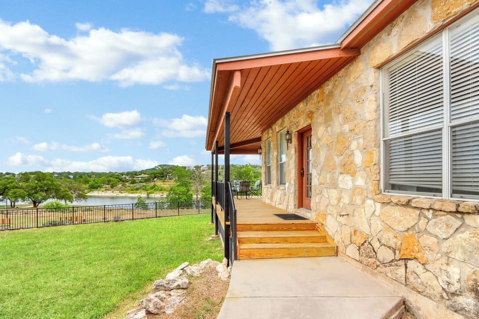 The entry door is on the rear of the house.  This is the walkway leading to the back porch.