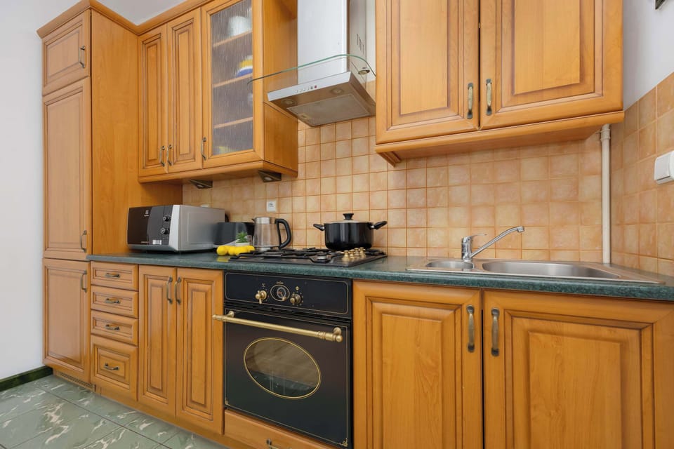 The fully equipped kitchenette includes everything you need for a home-cooked meal.