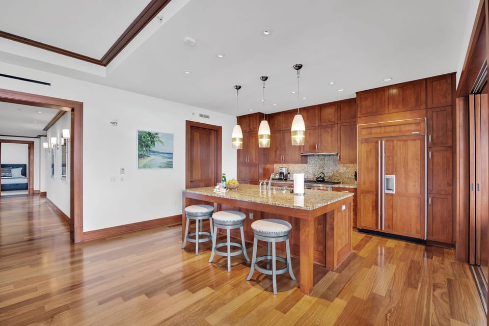 Kitchen and island bar ready for breakfast spreads or evening wine prep