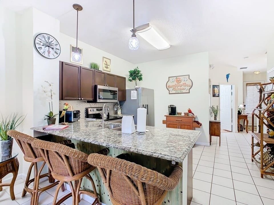 Cozy breakfast bar with seating, ideal for casual dining or a morning coffee.