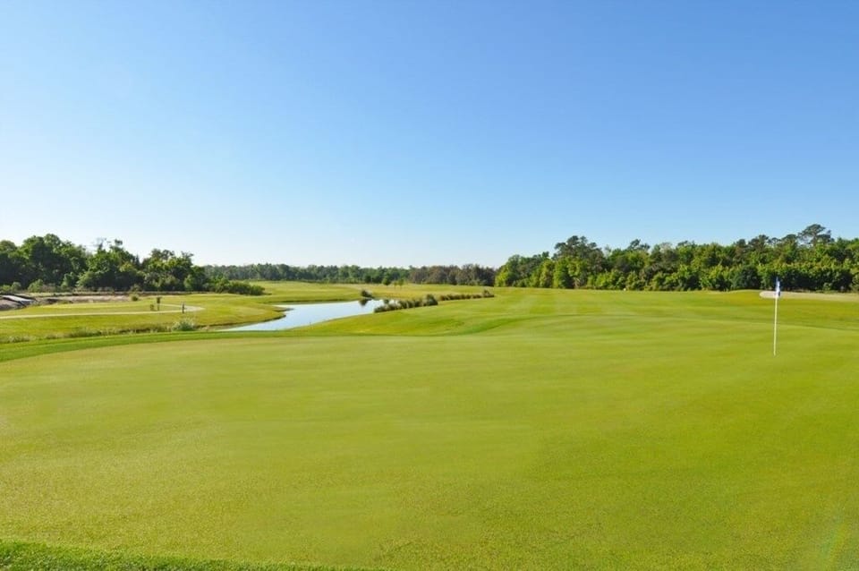 Stunning golf course with rolling greens and serene surroundings.