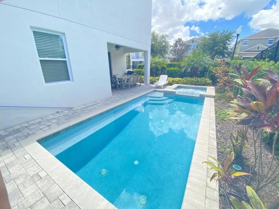 Relax by the private pool under sunny skies—your personal paradise.