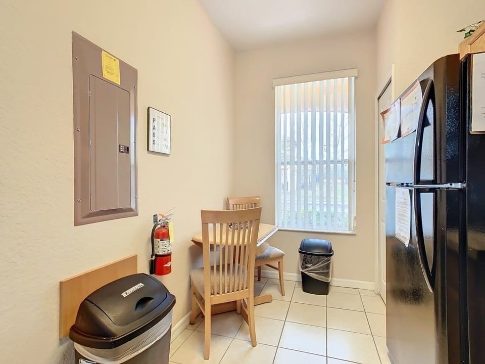 Cozy dining nook with natural light, perfect for enjoying meals or snacks.