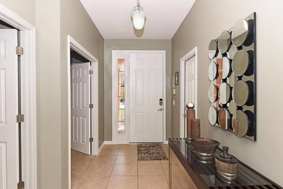 Step into a bright and inviting entryway that sets the tone for a cozy and stylish stay.