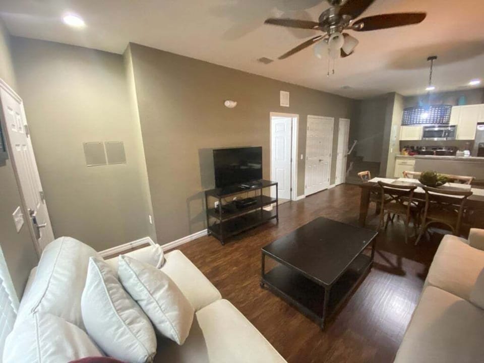Relax in the spacious living room, complete with a flat-screen TV.