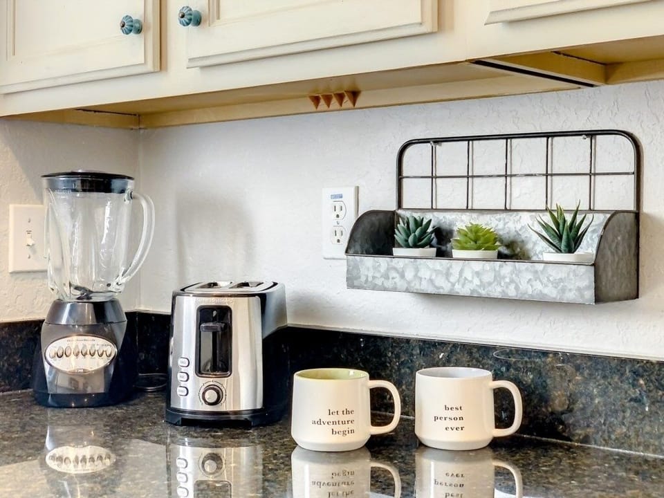 Fully equipped kitchen with modern appliances and everything you need for a home-cooked meal.