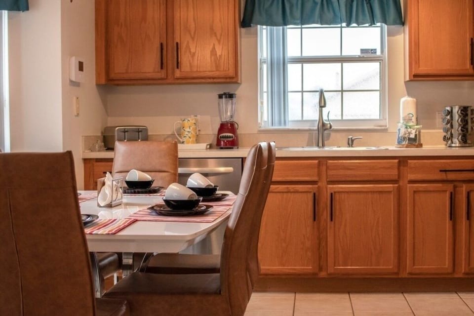 Sunlit kitchen with a functional layout for preparing delicious meals.