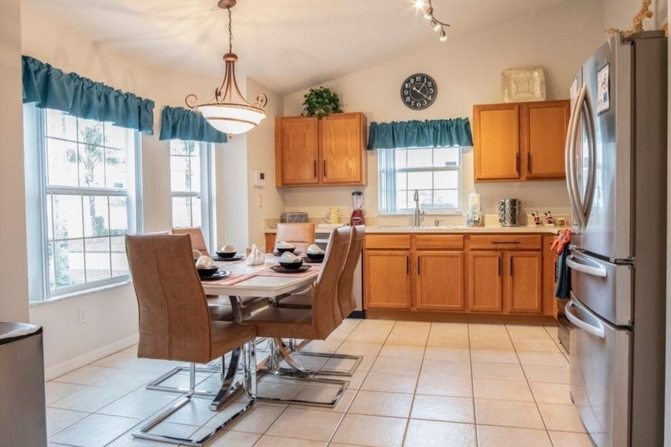 Bright and spacious kitchen with a cozy dining nook.