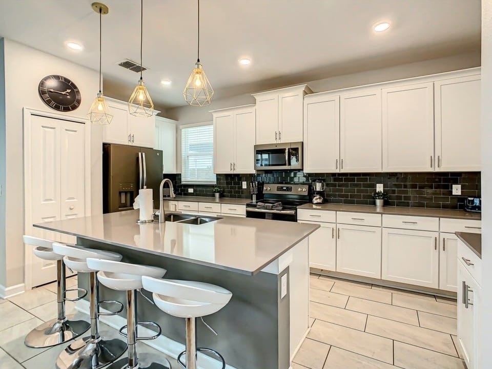 Modern kitchen with a spacious island, sleek appliances, and plenty of counter space.