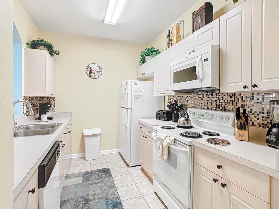 Fully stocked kitchen with modern amenities to make cooking effortless and enjoyable.