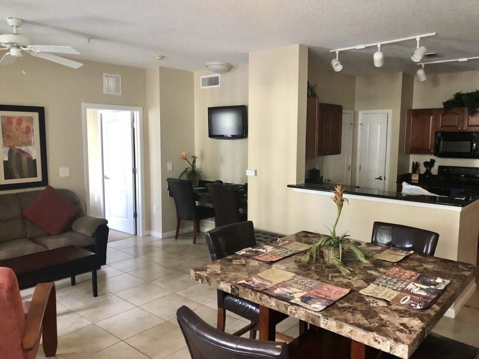 Elegant dining space with a large table, perfect for meals or gatherings with loved ones.