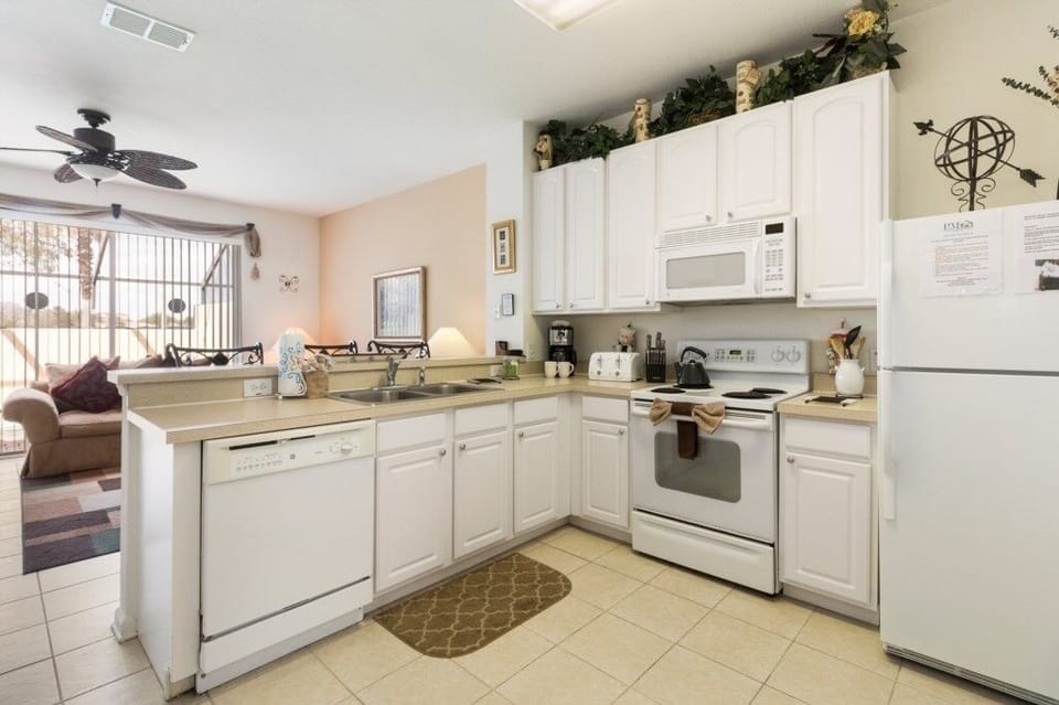 Fully equipped kitchen with modern appliances, ready for your culinary adventures.