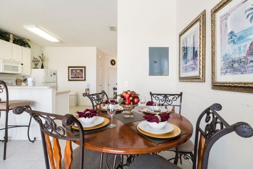Dining area set for four, perfect for enjoying meals with family or friends.