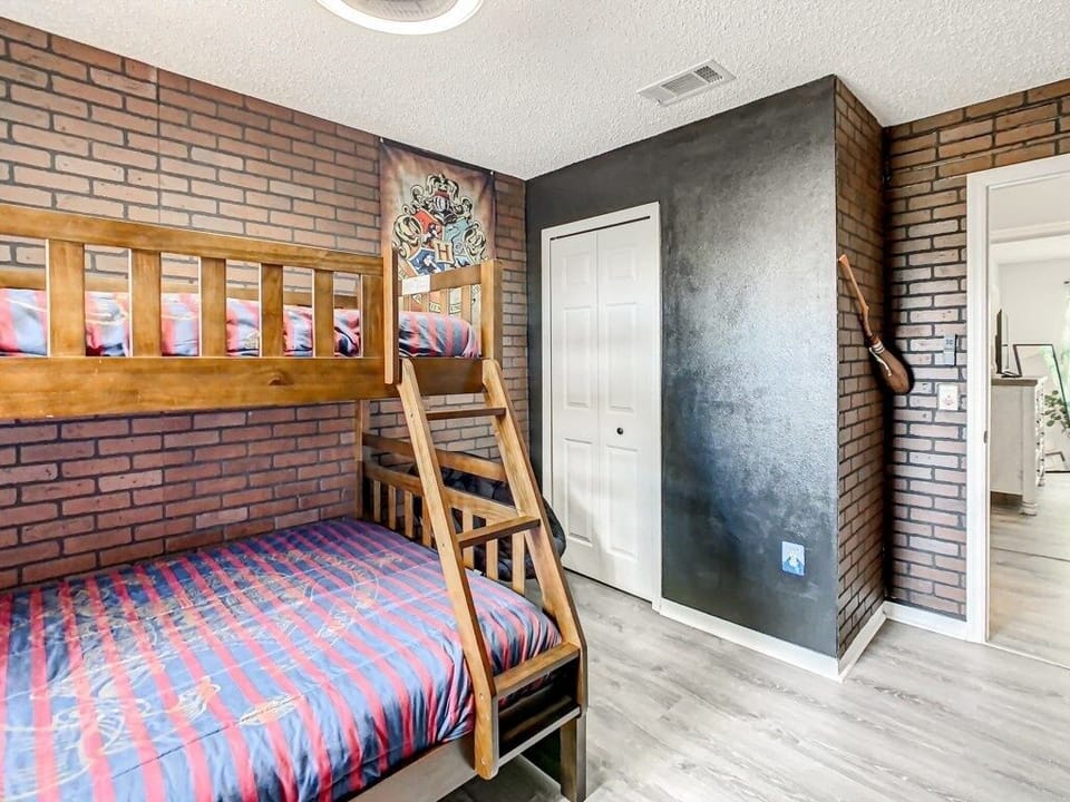 Themed bedroom with bunk beds and fun decor, perfect for a magical stay for kids and families.
