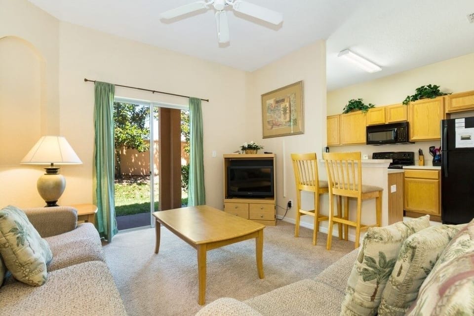Bright and airy living room with direct access to a private patio.