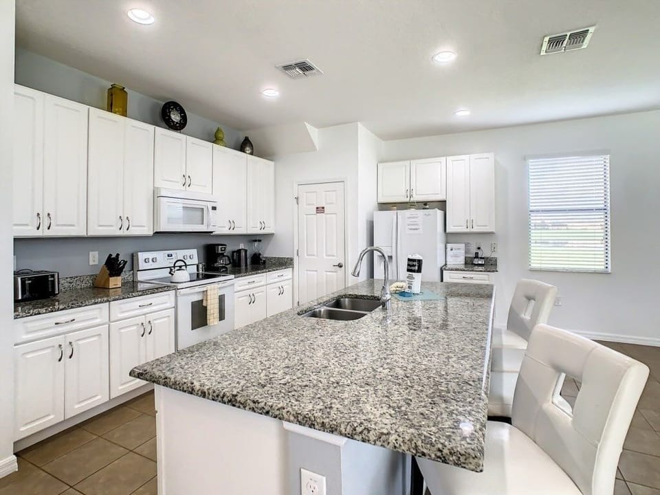 Spacious kitchen with updated appliances and a bright, open layout.