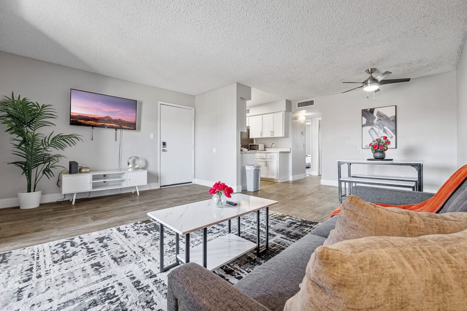 📺 Open living space with a sofa bed and smart TV for movie nights.