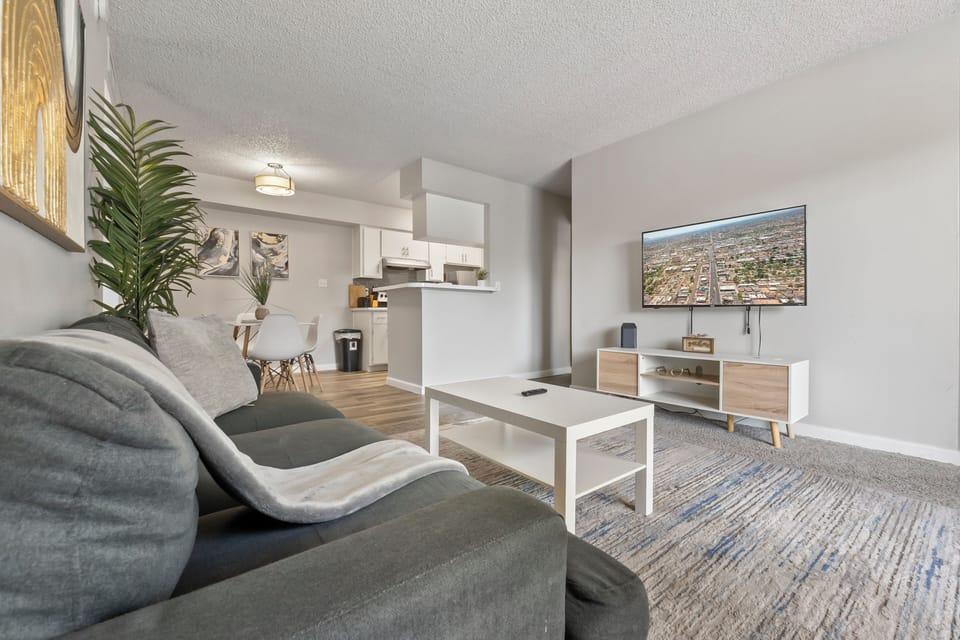 ☀️ Bright, airy living room with modern furnishings.