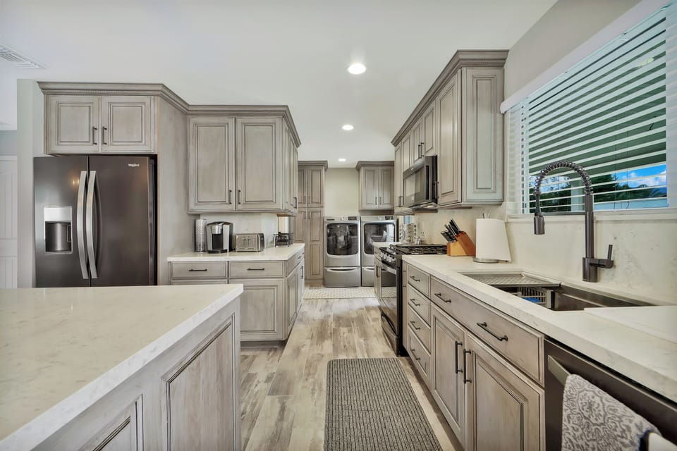 View from Kitchen to Laundry Area.