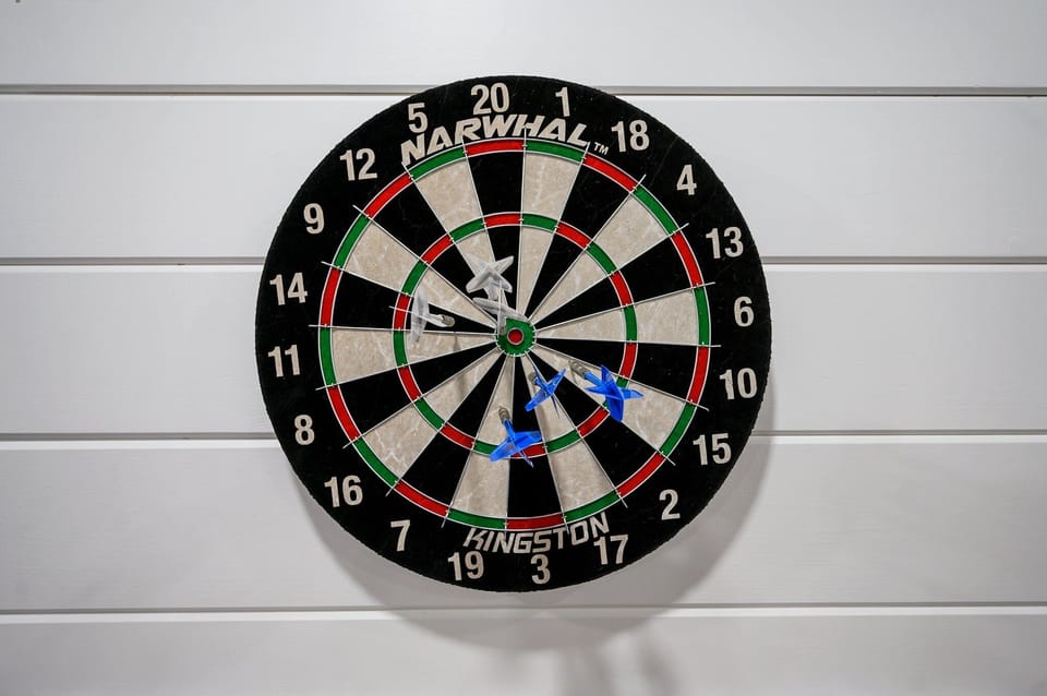 Bullseye-ready dartboard with sleek panels for game night and precision play.