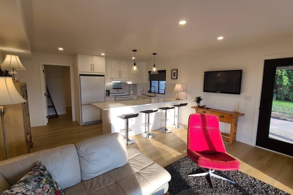 A two bedroom, fully contained walk-out suite with a full kitchen and full laundry. 