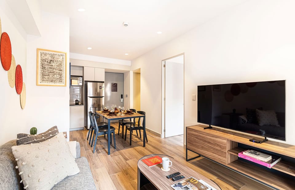 The building contains several similar units, Furniture, decor, and amenities may vary.
