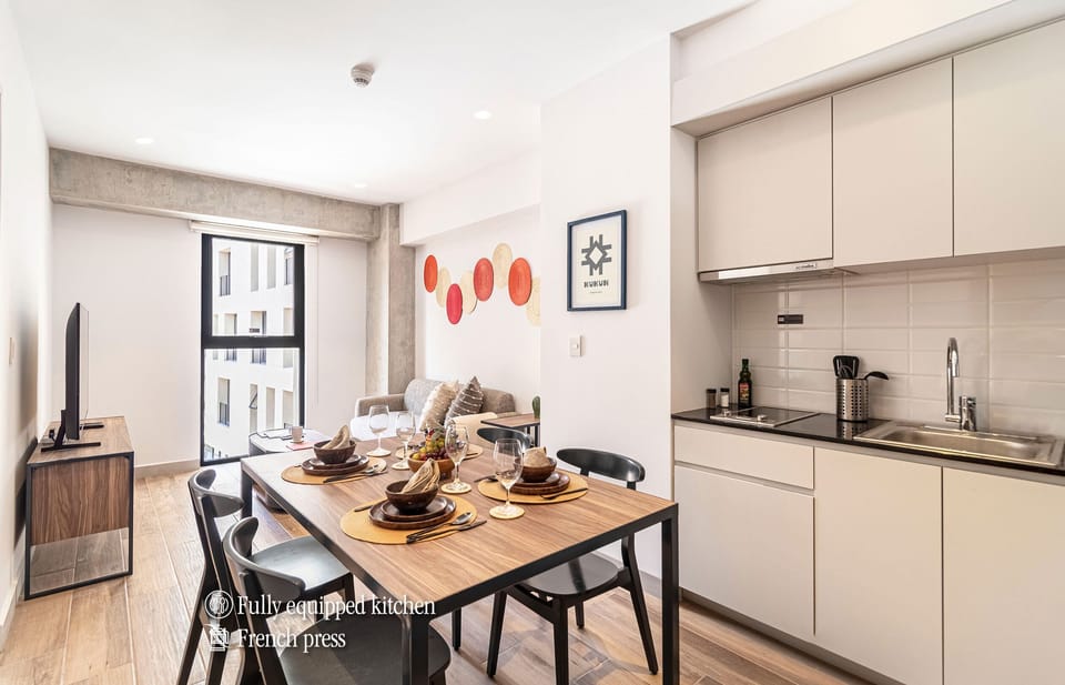 The building contains several similar units, Furniture, decor, and amenities may vary.