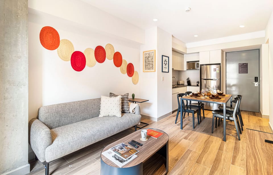 The building contains several similar units, Furniture, decor, and amenities may vary.