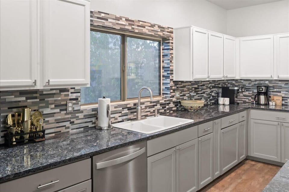 Kitchen goals achieved! Whip up your favorite meals in our stylish and fully equipped kitchen. Coffee's on us (you make it!). 
